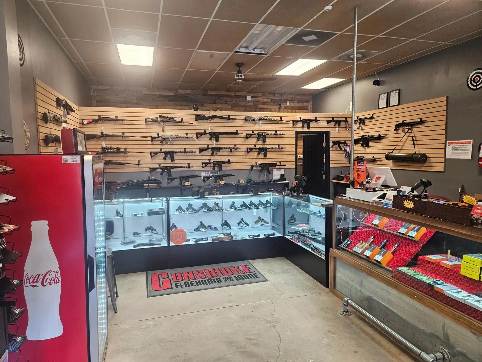 Gun counter and rifle wall inside Gunsmoke